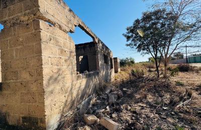 Residential plot for sale with unfinished structure